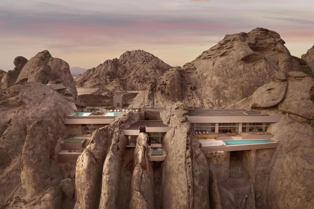 This desert resort in saudi arabia feels like a hidden world carved into stone and silence